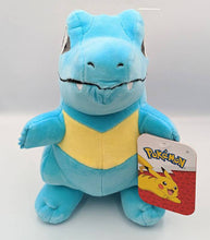 Load image into Gallery viewer, Totodile 8&quot; plush Pokemon toy with blue skin and toothy grin.
