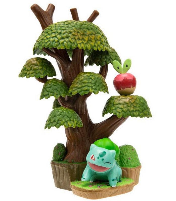 Pokemon Select Summer Forest Environment pack with Applin and Bulbasaur figures displayed among trees.