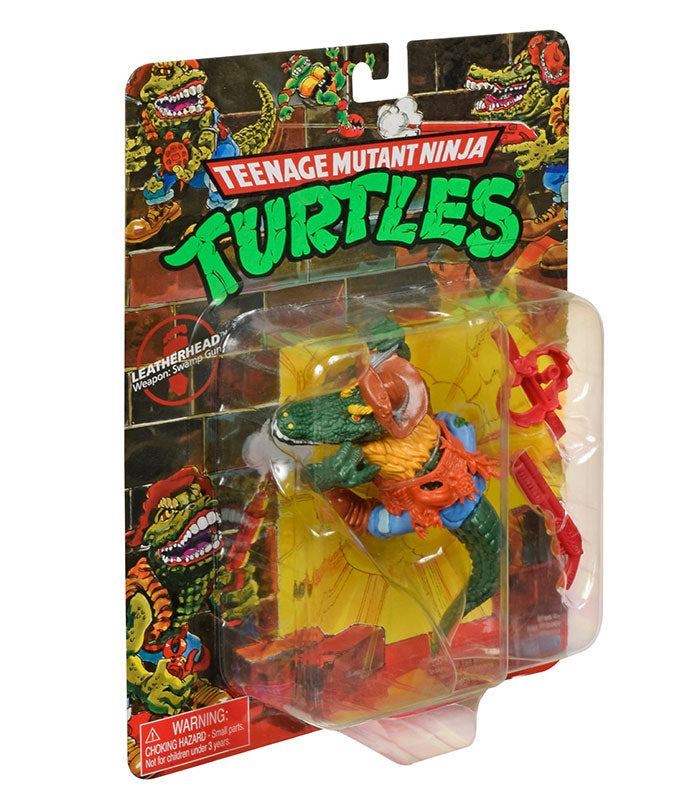 Teenage Mutant Ninja Turtles Classic Leatherhead action figure in packaging with weapons.