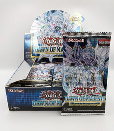 Yu-Gi-Oh! Dawn Of Majesty Booster Pack with cards on display.