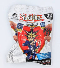 Load image into Gallery viewer, Yu-Gi-Oh! Micro Figures Blind Bag, collectible mini figures featuring iconic characters like Blue-Eyes White Dragon and Dark Magician.
