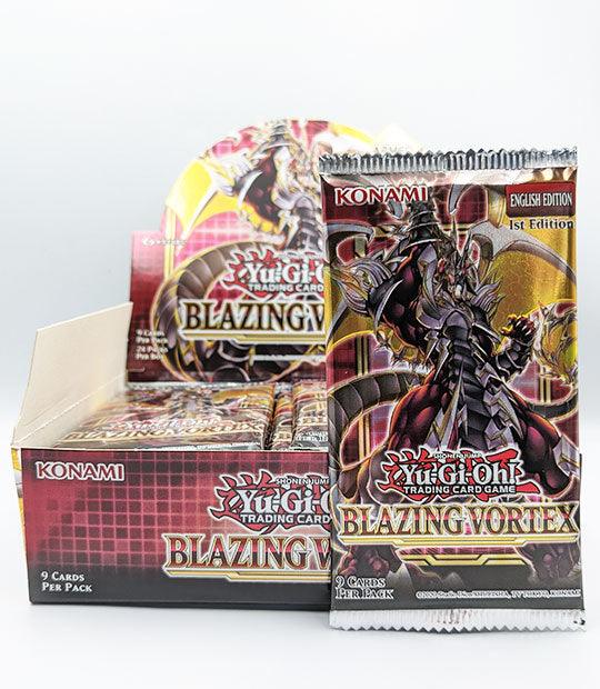 Yu-Gi-Oh! Blazing Vortex booster pack display box with individual pack showing card artwork.